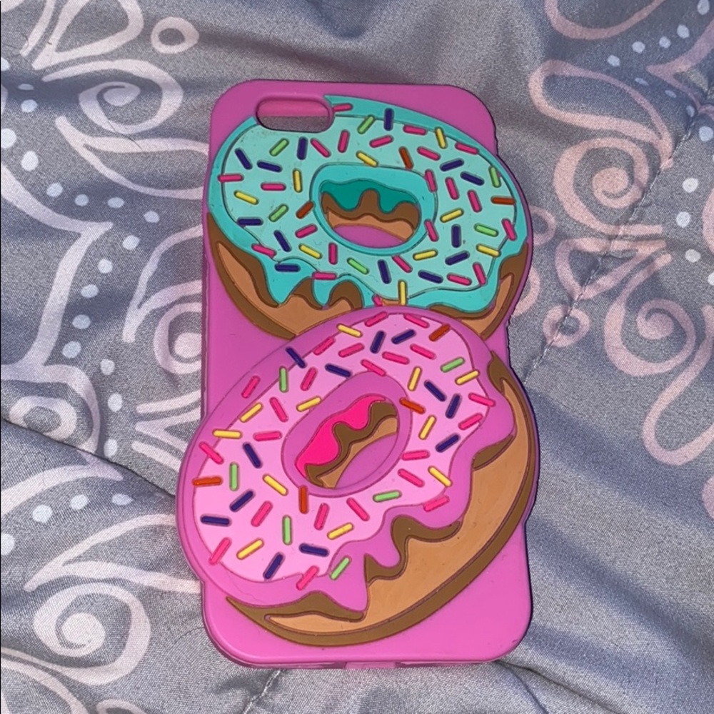 silicone case with teal&pink sprinkle donuts on it